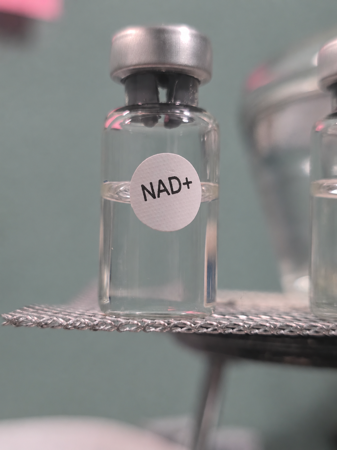 Illustrative relabeled NAD+ vial photograph
