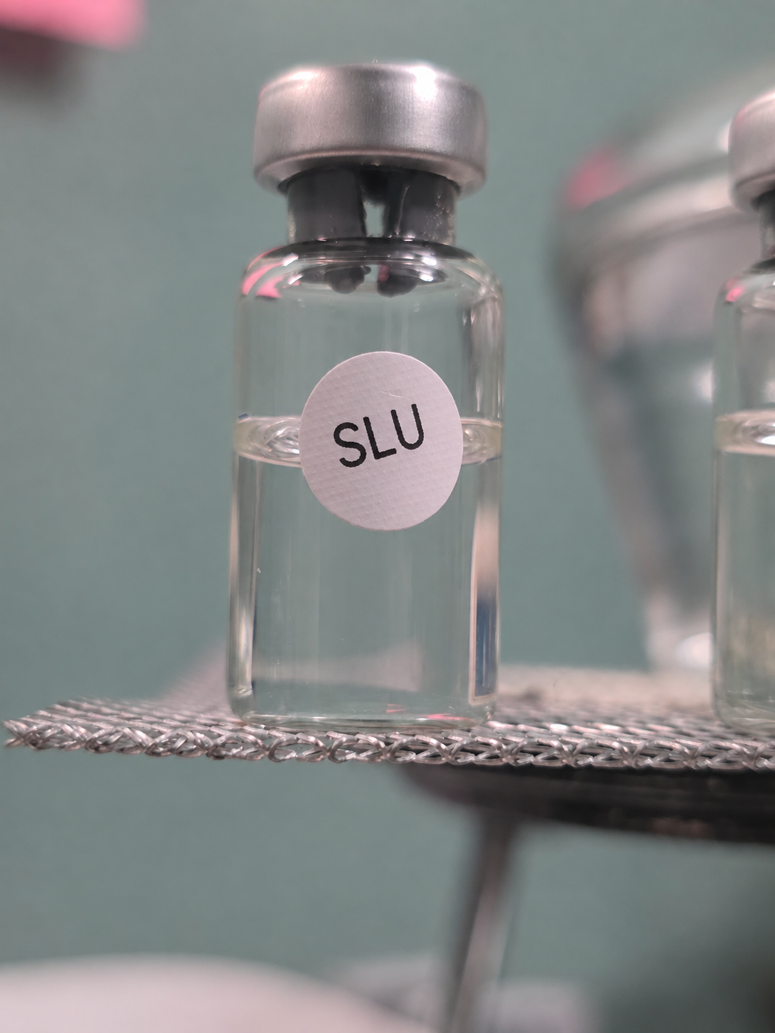 Illustrative relabeled SLU-PP-332 vial photograph